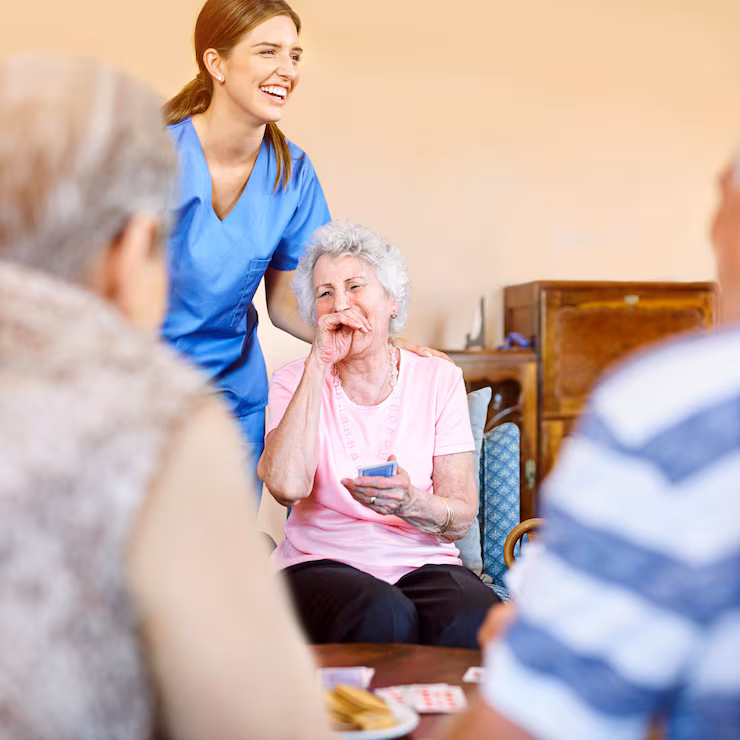 women-nurse-laughing-patient-with-playing-cards-games-fun-happy-nursing-home-people-caregiver-smile-with-bonding-care-support-trust-healthcare-entertainment_590464-393096